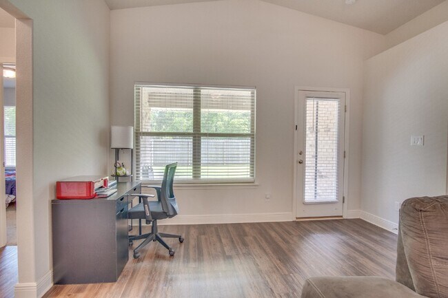 Building Photo - Spacious 4BR/2BA Brick Home with 2-Car Garage, Granite Kitchen, Vaulted Ceilings & Fully Fenced B...
