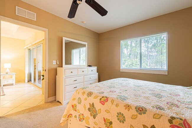 Building Photo - Peaceful Preserve-View Condo in Gated Blue Heron