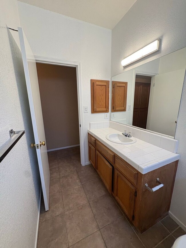 Building Photo - Spacious 3 Bedroom, 2 Bath Tevis Ranch Home with Fireplace, Covered Patio & 2-Car Garage