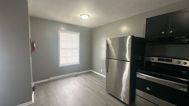Building Photo - FIRST FULL MONTHS RENT FREE!! 2 Bedroom Duplex with Huge Back Yard!