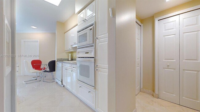 Building Photo - 4779 Collins Ave