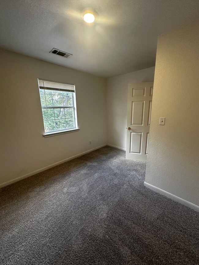 Building Photo - Lovely Cedar Creek Home on Large Shaded Lot
