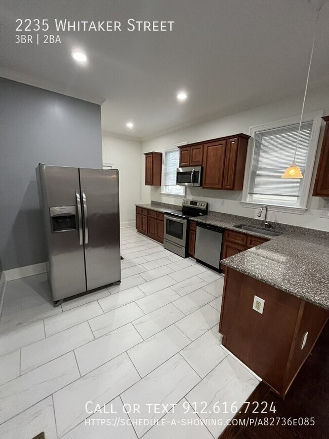 Building Photo - "Spacious 3-Bed, 2-Bath Duplex with Granit...