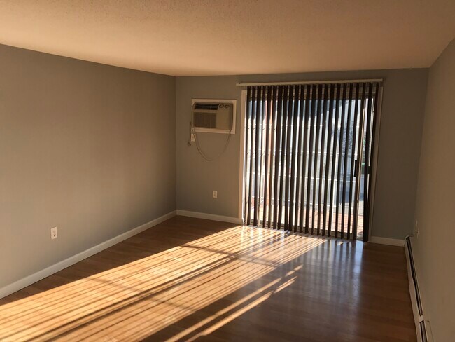 Living room with patio - 1301 White Cedar Blvd