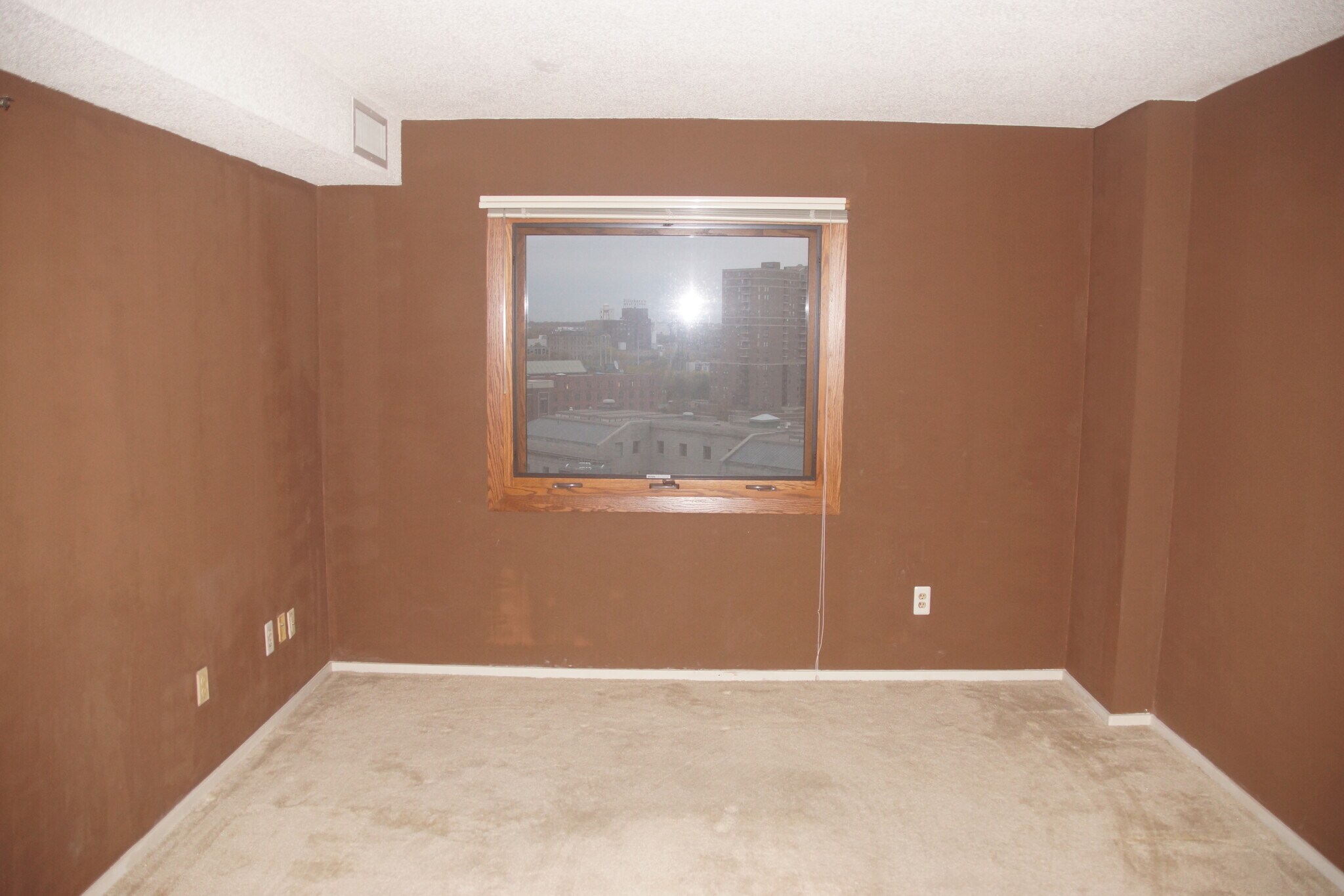 Bedroom 2, before updated paint and carpet - 121 Washington Ave S