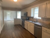 Building Photo - 2/2 with fenced yard and 2 living areas