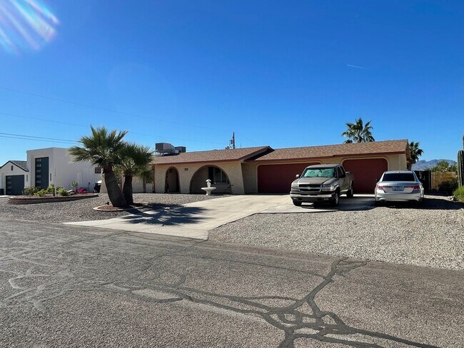 Building Photo - OWNER'S SUMMER SPECIAL-$300 OFF first 3 months! Sparkling Pool Home!