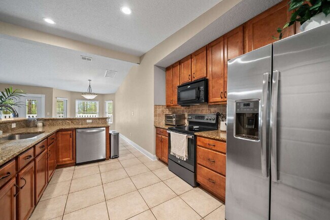 Building Photo - Luxurious Palm Coast Retreat: 4-Bed 3 Bath...