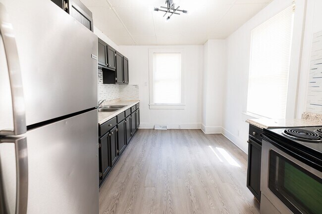 Building Photo - Move-In Ready 4BR Home with Large Backyard