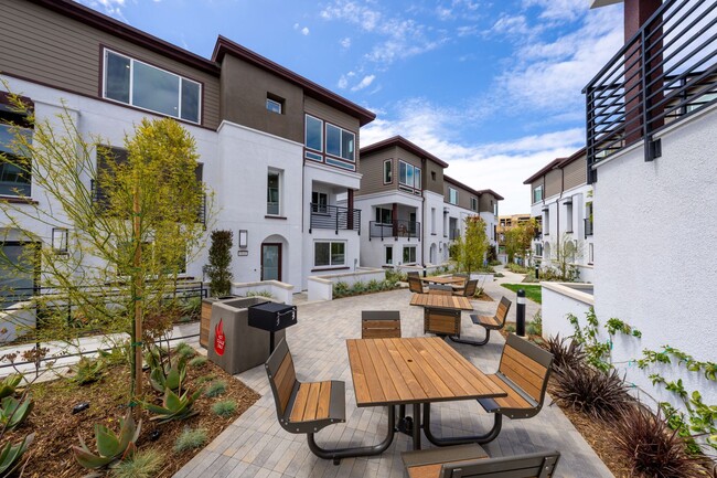 Building Photo - Available now! Brand New 4 Bedroom Townhom...