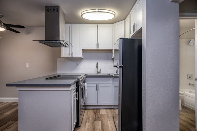 Building Photo - Fully remodeled studio apartment in gated ...