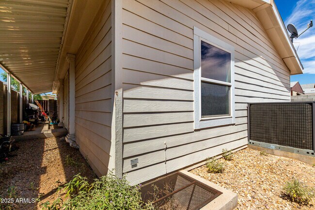 Building Photo - 8601 N 103rd Ave