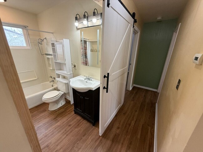 Building Photo - 4 Bedroom 2 Bathroom Home on Large Corner Lot with 2 Car Attached Garage In Great Neighborhood In...