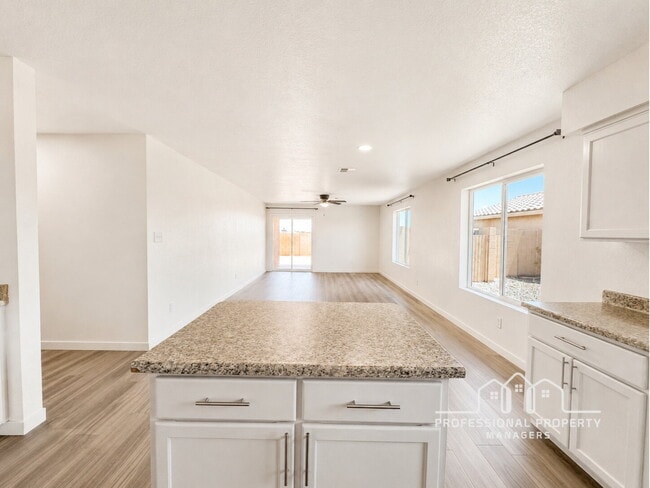 Building Photo - 4-bedroom, 2-bathroom home in Desert Oasis