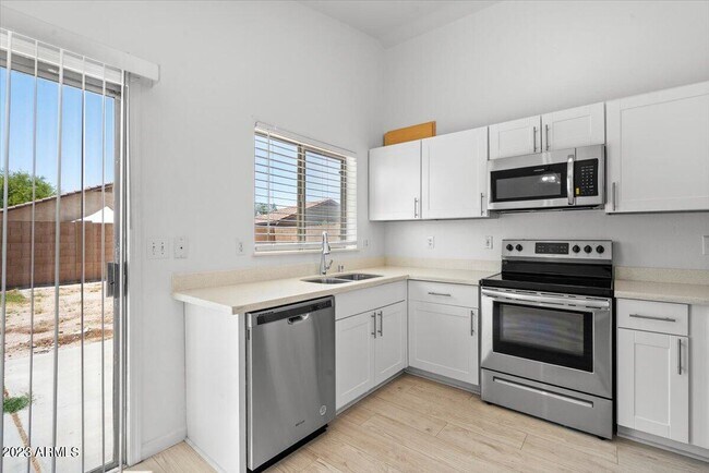 Building Photo - 14975 W Acapulco Ln