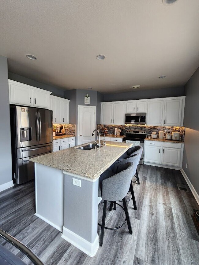 Building Photo - Long Realty & Property Management - 5 bedroom Stunning Home with Full Finished Basement