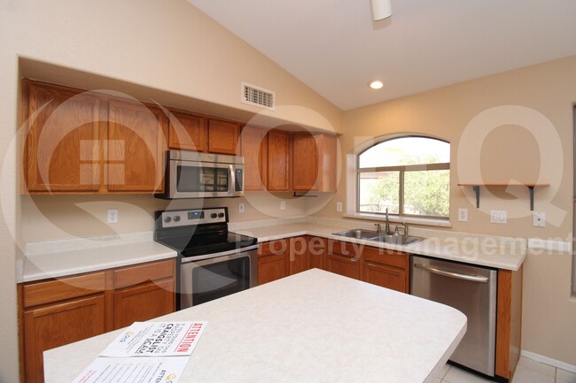 Building Photo - 9953 E Onza Ave