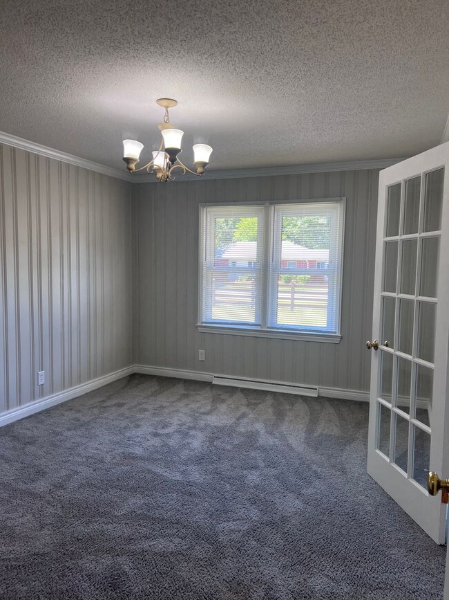 Building Photo - Country Living with City Convenience!