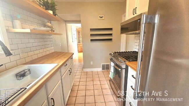 Building Photo - 5816 12th Ave S