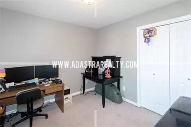 Building Photo - Spacious Maintenance Free Townhome in Gard...