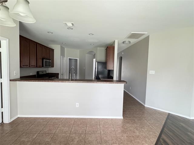 Building Photo - 9512 Crooked Cat Dr