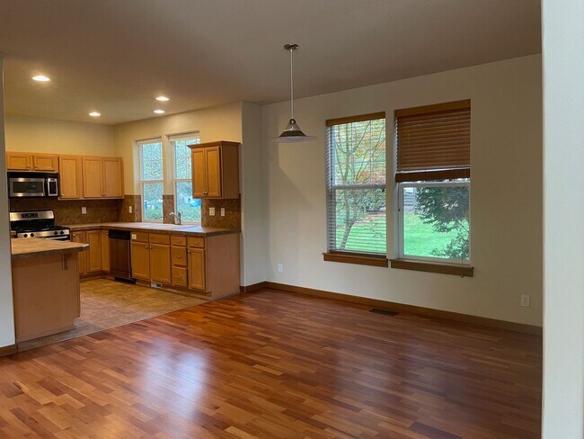 Building Photo - Lovely Corner Lot with Open Floor Plan, High Ceilings, Gourmet Kitchen.