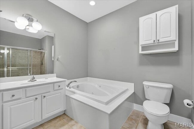 Building Photo - Welcome home to this bright and inviting 2-bedroom, 2-bathroom apartment on the second floor at 7...
