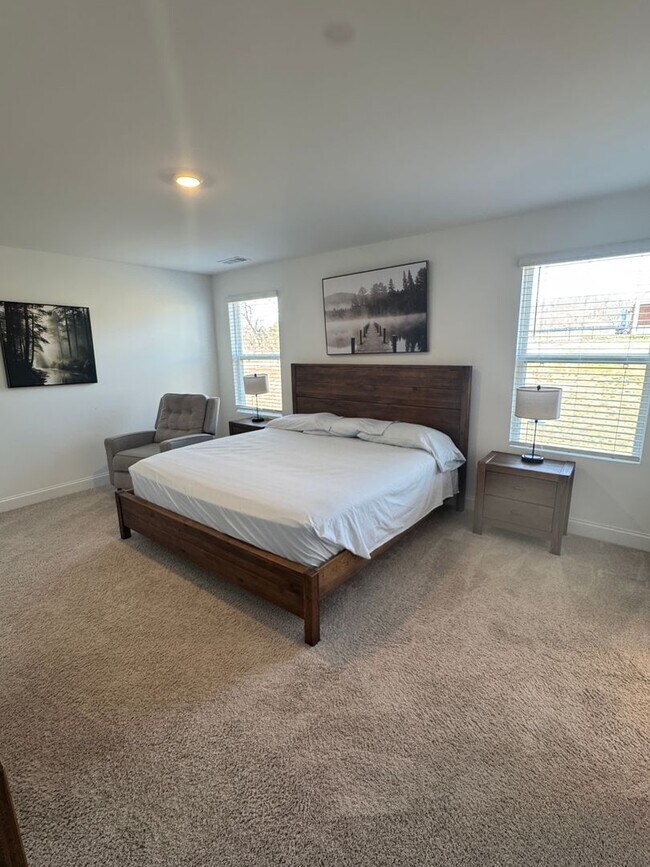 Building Photo - Fully Furnished 4BR Home with Loft, Patio & 2-Car Garage – Lawn Care Included