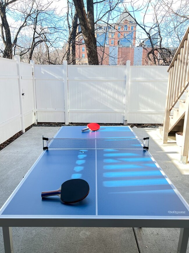 Building Photo - RENOVATED TOWNHOME WITH DECK BY METRO