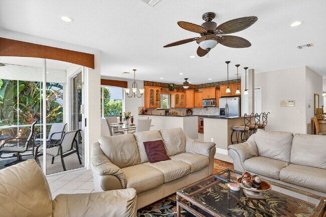 Building Photo - This 2 bedroom plus den, 2 bath condo with a one car garage offers expansive golf course and lake...