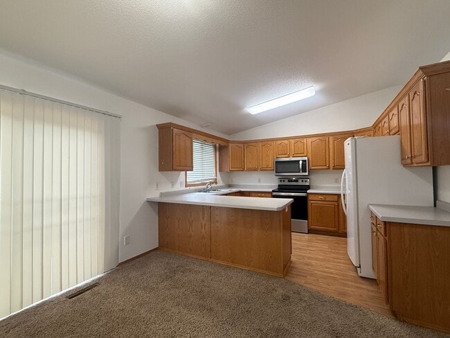 Building Photo - Spacious 3BR Home in Legacy School District with 3 Living Areas & 2-Stall Garage