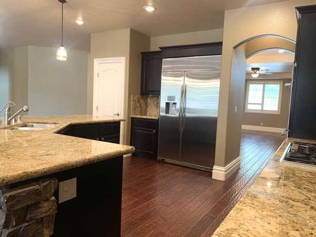 Building Photo - Four Bedrooms, Loft, and Downstairs Bedroo...