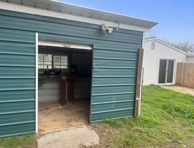 Building Photo - Conveniently Located Home with Attached Studio!