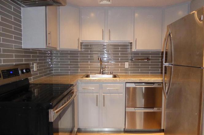 Remodeled Kitchen with stainless steel appliance. - 1436 Meridian Pl NW