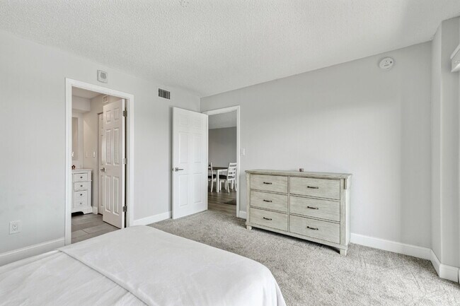 Building Photo - NEWLY RENOVATED TWO BEDROOM CONDO IN WATERFRONT RESORT STYLE COMMUNITY