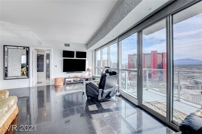 Living Room with 3 TVs - 2700 Las Vegas Blvd S