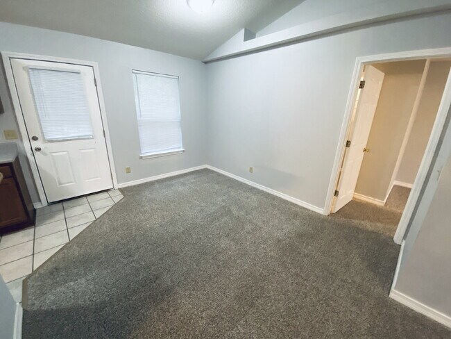 Building Photo - Fantastic location! This end unit offers t...