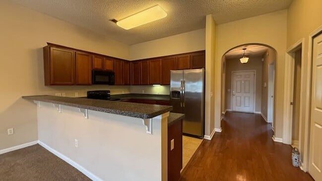 Building Photo - 3 bedroom - 2 bathroom - Stonelake Townhom...
