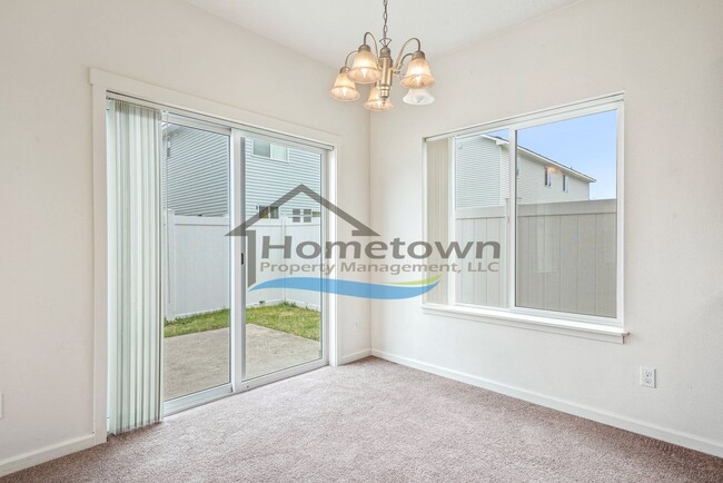 Building Photo - Townhouse Style Home with 3 Bedrooms, 2.5 Bathrooms, and a 2-Car Attached Garage Available in Coe...