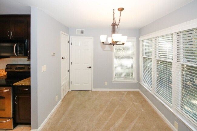 Building Photo - Secluded Community Near The Perimeter Mall