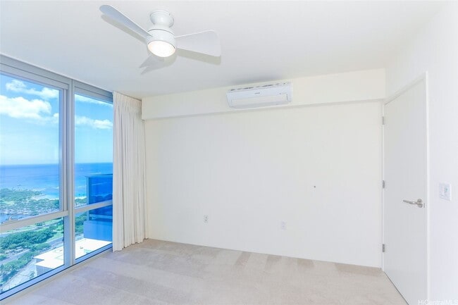 Building Photo - Priced Low to Sell!! Top floor with floor to ceiling windows to enhance the spectacular ocean