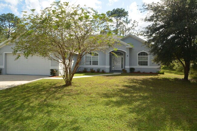 Primary Photo - "Charming 3-Bed Oasis in Palm Coast - 1,85...