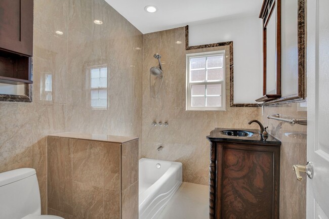 Building Photo - Stunning Remodeled Corner-Lot Home – An En...