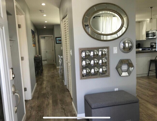 View from front door (living/kitchen on right, bedrooms on left, laundry in center) - 6735 Saint Clair Ave
