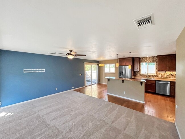Building Photo - Beautiful 4BD/2BA W/ 2-Car Garage, AC, and...