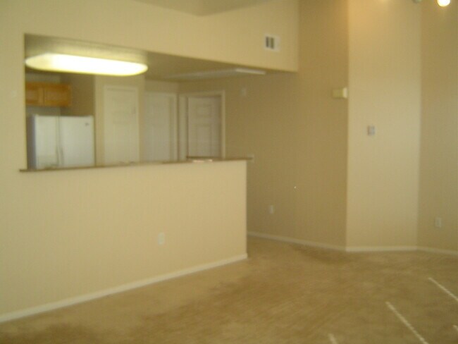 Building Photo - Move-In Ready Condo with Private Balcony & Modern Upgrades