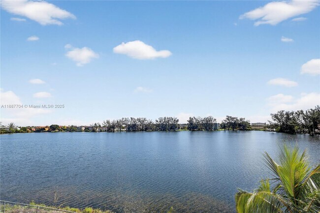 Building Photo - 9915 W Okeechobee Rd