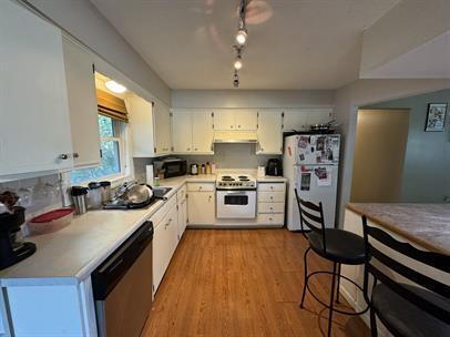 Building Photo - "Charming 3-Bed Home with Hardwood Floors & Finished Basement in St. Louis Park!"