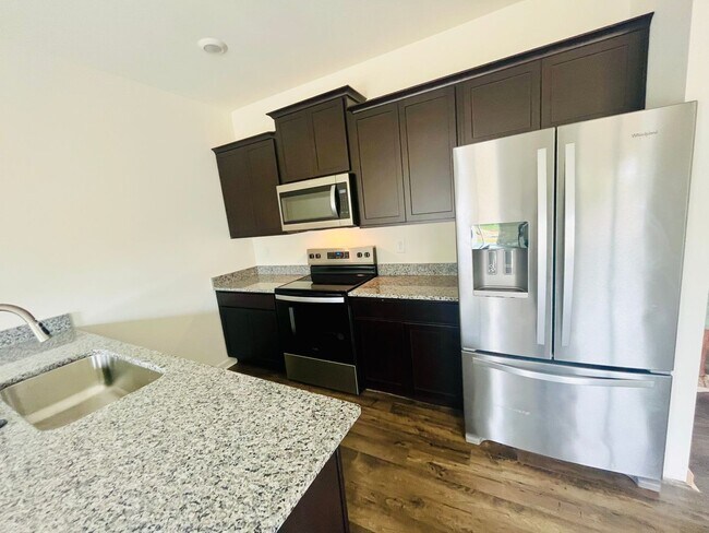 Building Photo - Be the First to Call This Brand New Townho...