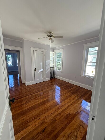 Middle room has 2 windows, closet, and room for a queen or full bed and dresser - 27 Seven Pines Ave